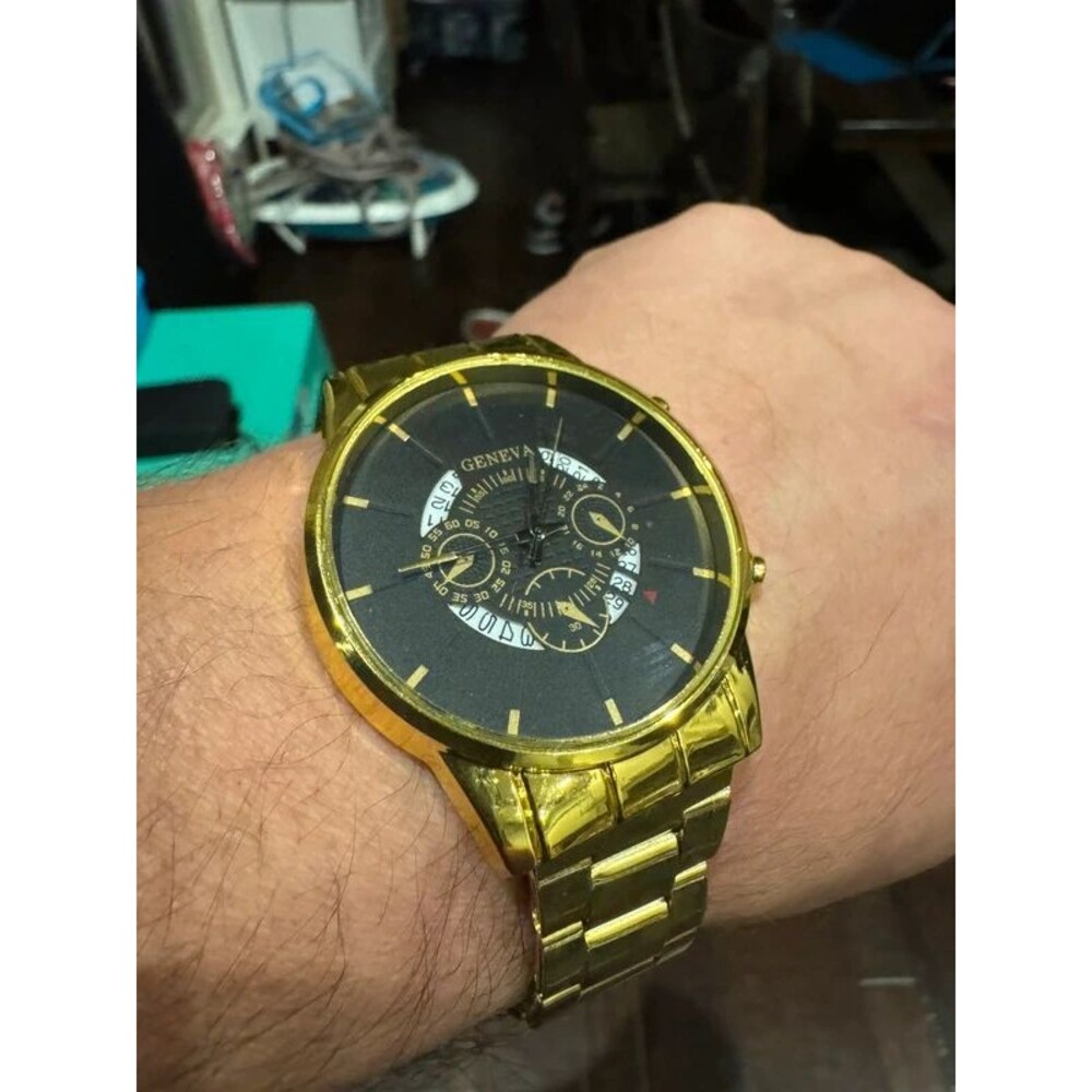 Budget quartz gold watch with black dial